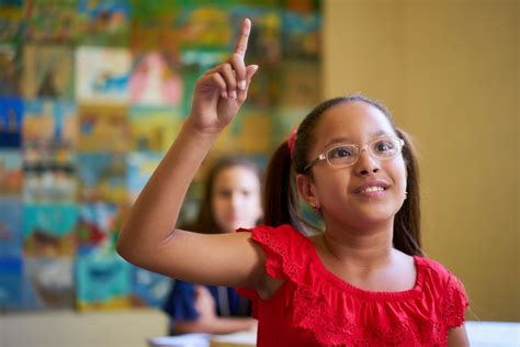 How To Help Your Child Feel Comfortable Raising Their Hand In Class