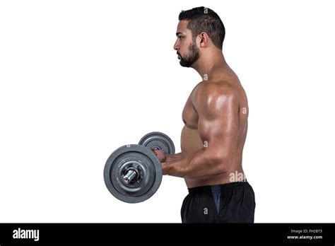 Muscular Man Lifting Heavy Barbell Stock Photo Alamy