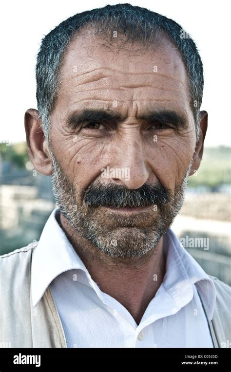 Portrait Of A Middle Aged Kurdish Man With A Moustache In The City Of