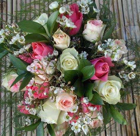 Wonderful Roses And Wax Flower Bouquet A T To Your Door Arranged And Delivered By