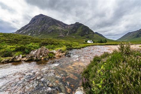 Scenic View Of River Coupal In Glencoe Valley With Buachaille Etive Mor