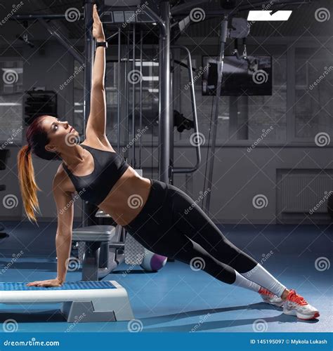Sporty Girl In Fitness Hall On Cycle Stock Photography Cartoondealer Com