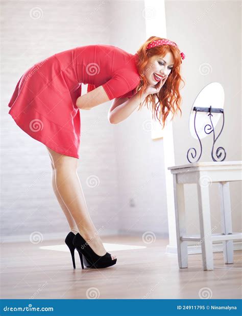 cheerful redhead girl stock image image of checking 24911795