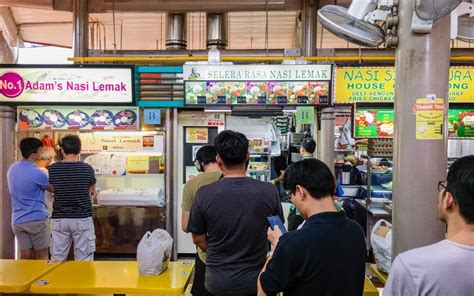 $10 nasi lemak set consists of fragrant basmati rice, crispy chicken wing, bergedil, fried egg, ikan bilis and peanuts, sambal chili, cucumber and a drink of your choice. Selera Rasa Nasi Lemak at Adam Road Food Centre in Singapore