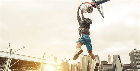 Basketball Street Player Making A Rear Slam Dunk New York And M A