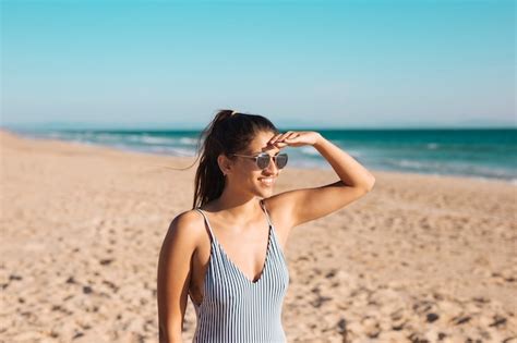 Woman In Sunglasses On Beach Free Photo