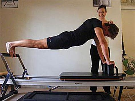 How To Correct An Exercise On The Pilates Reformer A Sagging Plank On