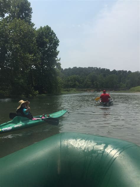 floating 8 miles down the elk river with kayaks canoes and raft from two sons in noel