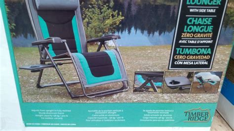 The cozzia dual power zg recliner is designed to allow your body to reach a high level of relaxation and brings a terrific sense of fashion to any room. Timber Ridge Zero Gravity Chair and Lounger with Side Table | Costco Weekender