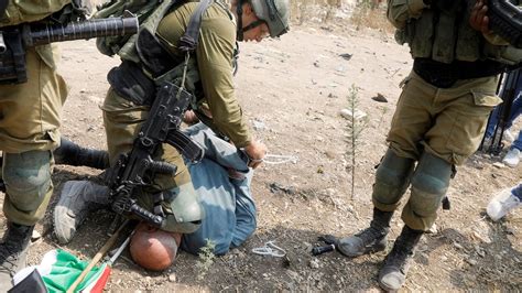 Israeli Soldier Condemned For Putting Knee On Palestinian Protester S Neck Bbc News