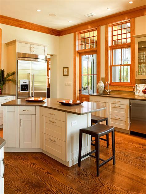 White cabinets make the most of natural light in this modern farmhouse kitchen by house of jade interiors. Wood Trim White Cabinets Home Design Ideas, Pictures, Remodel and Decor
