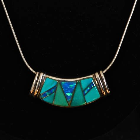 Sterling Silver Pendant Necklace Featuring Inlaid Turquoise And Opal