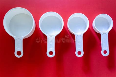 Set Of White Measuring Cups Measuring Spoons Use In Cooking Lay On