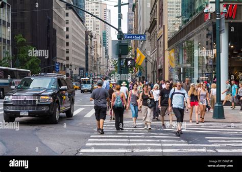 Manhattan New York Street Scene People Walking Across A Downtown Crosswalk In Manhattan New