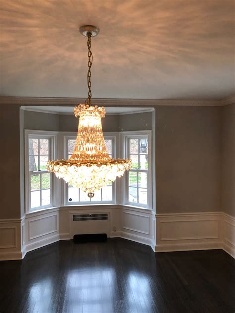 In this diy smarts, heath eastman installs a chandelier in a homeowner's dining room. Chandelier Installation - Luminous Electric LLC
