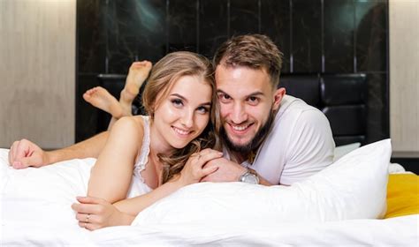 Premium Photo Man And Woman Lying In Bed Together