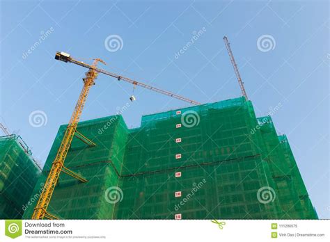 Under Construction Building With Finished Built Buildings Stock Image
