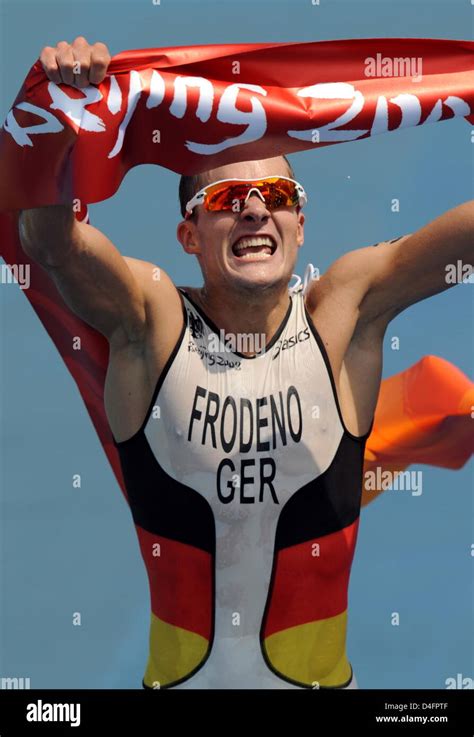 Jan Frodeno From Germany Celebrates Winning The Gold Medal Shortly