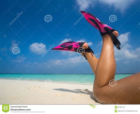 Woman Relaxing On Summer Beach Vacation Holidays Lying In Sand Stock