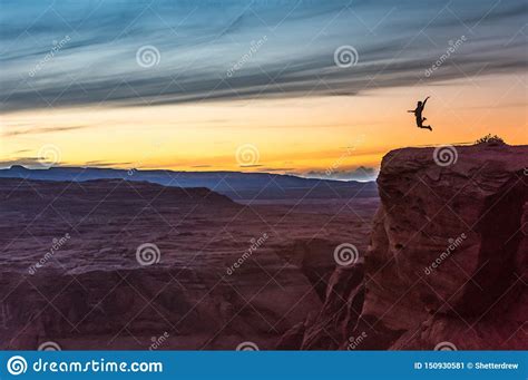 Majestic image of horse horse silhouette with rider on sunset background. Silhouette Of Person Jumping Atop Cliff With Sunset. Stock ...