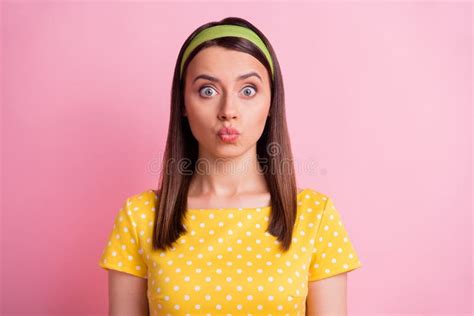 Portrait Of Impressed Pretty Brunette Girl Blow Kiss Wear Yellow Cloth Isolated On Pastel Pink