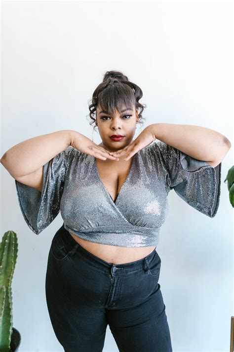 download fat girl in a silver metallic cropped top wallpaper