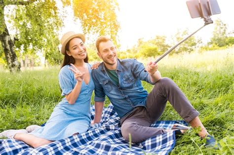 Free Photo Joyful Multiracial Adult Couple Taking Selfie