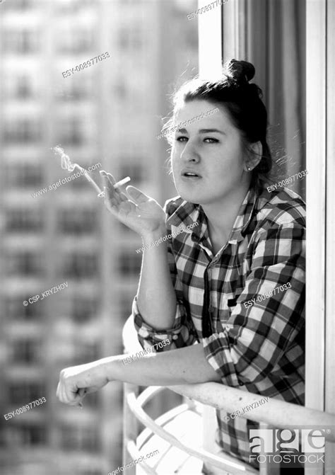 Closeup Portrait Of Babe Woman Smoking On Balcony Stock Photo Picture And Low Budget Royalty