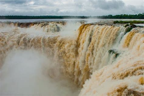 Tourists Visiting The Devil S Throat Waterfall In The Iguazu Falls One