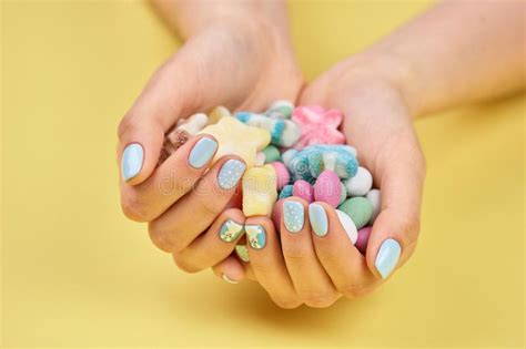 Colorful Candies In Womans Hands Stock Photo Image Of Advertise
