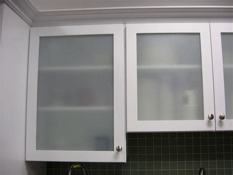 Cleaning kitchen cabinets with vinegar will easily remove fingerprints. glass kitchen cabinet doors uk frosted glass kitchen ...