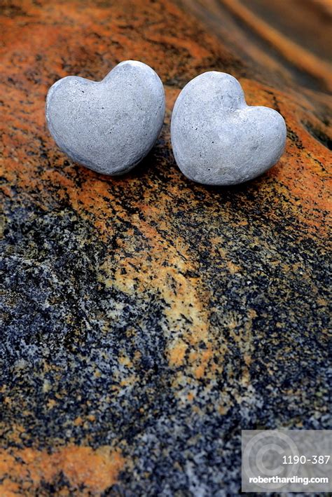 Two Heart Shaped Stones On Stock Photo