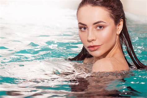 Beautiful Young Woman Swimming In The Pool Portrait Attractive Brunette Girl Stock Image