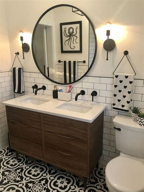 The frame material is not only attractive. Custom walnut vanity, quartz counter, Lowe's cementina ...