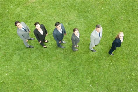 Business People Standing In Line Outdoors Stock Photo Download Image