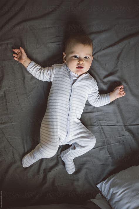 Portrait Of Baby Boy In Bed Del Colaborador De Stocksy Lumina Stocksy