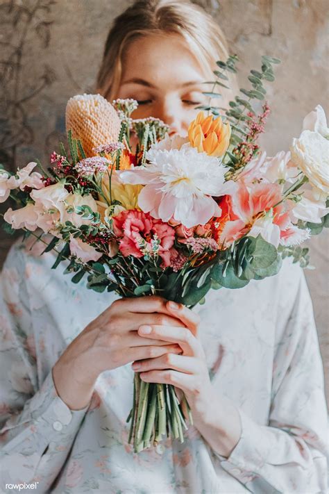 Woman Holding A Bouquet Of Flowers Premium Image By Rawpixel
