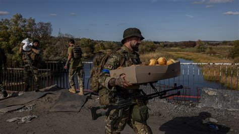 In Kyiv Suburb Symbolizing War, a Family Bids Farewell to a Fallen