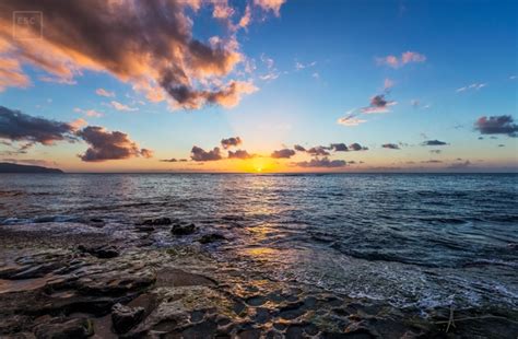 Staring Into The Sun Sunset On Laniakea Beach In Oahu