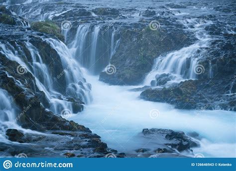 Turquoise Cascades Of The Bruarfoss Waterfall Iceland Stock Image