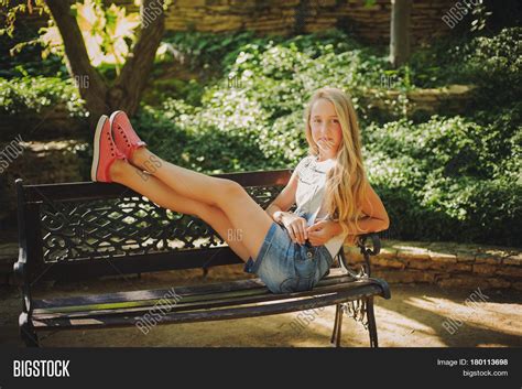 Young Girl Sitting On Image And Photo Free Trial Bigstock