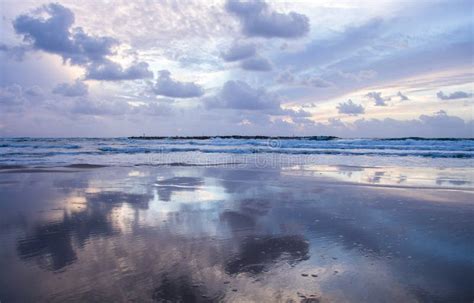 Beautiful Scene Cloudy Blue Sky Reflected On Beach Wet Sand Stock Image