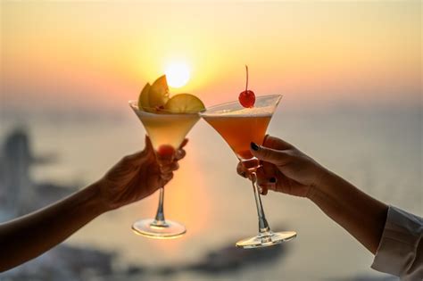 Premium Photo Couple Enjoying Of Cheers Glass Of Cocktail In A