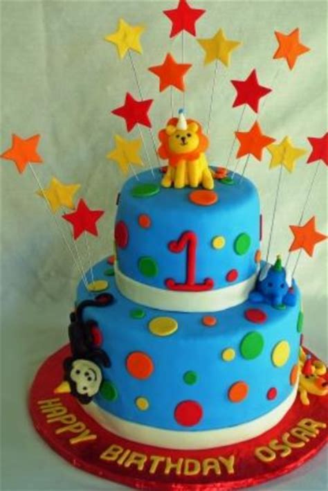 We offer a range of 1st birthday cakes that come in flavours that both children and adults will love. Two tiers cakes ideas for first birthday with jungle ...