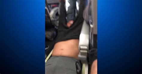 Video Passenger Is Dragged Off Overbooked United Flight Cbs Colorado