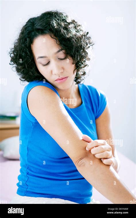 Itching In A Woman Stock Photo Alamy