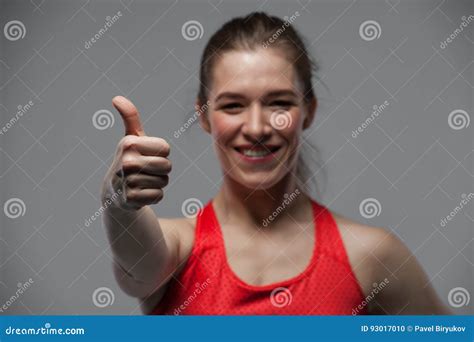 Happy Sports Woman Showing Thumbs Up Gesture Stock Photo Image Of Muscular Smiling