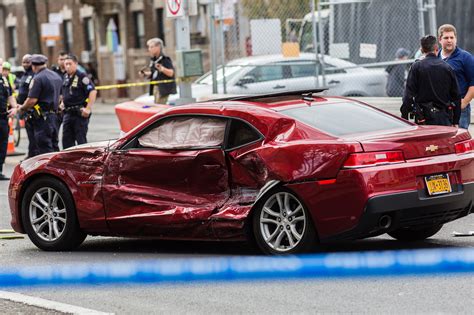 Driver In Red Camaro Hits Pedestrian After Running Light Getting In Crash