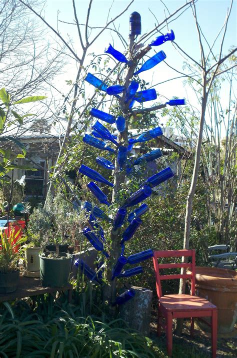 Bottle Tree Will Have Yellow Climbing Rose Around It This