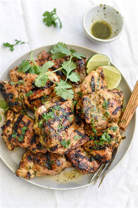Covering chicken will allow it to get cooked through in the thickest part without burning. Cilantro Lime Grilled Chicken | foodiecrush.com